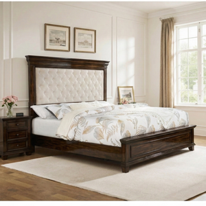 Wooden bed with tufted headboard in a bedroom setting