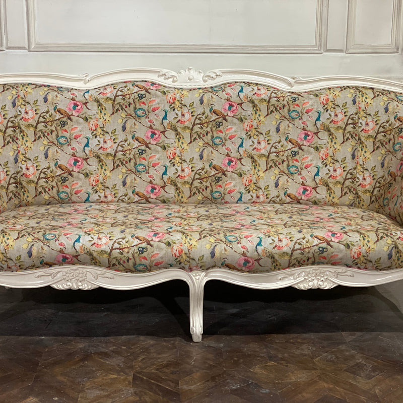 Sofa of Louis XV elegance with a slightly higher back