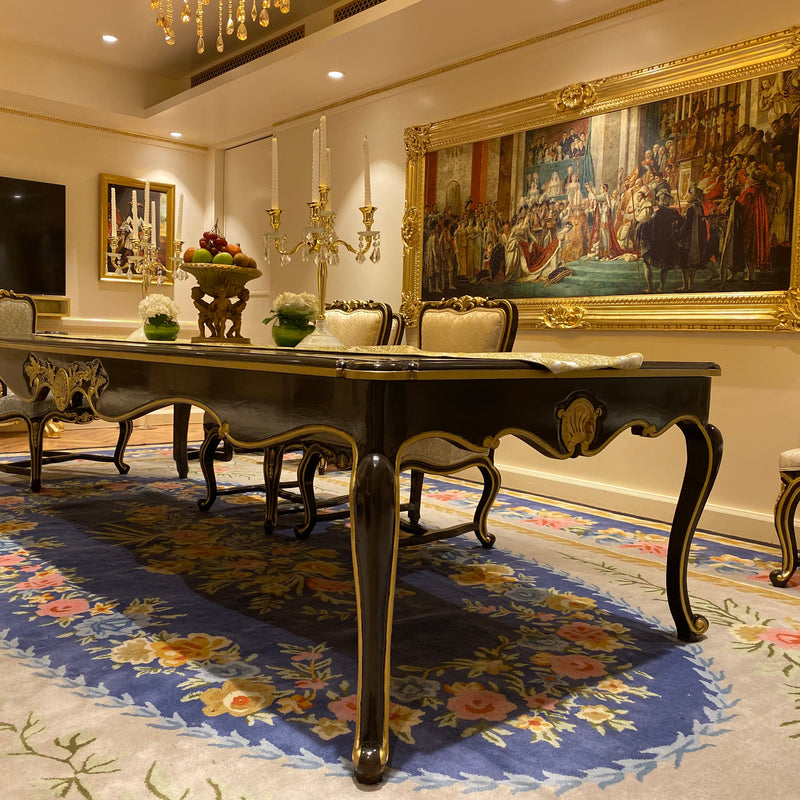 Dining table of Louis XV era with subtle rococo sensibilities