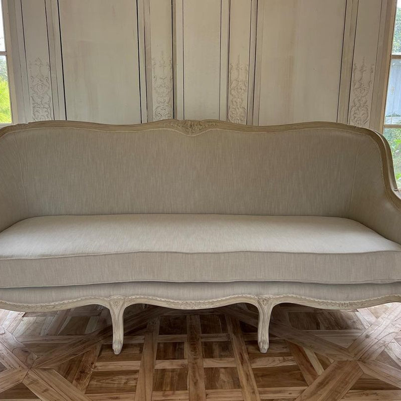 Louis XV bergère sofa of simple elegance