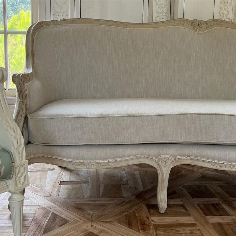 Louis XV bergère sofa of simple elegance