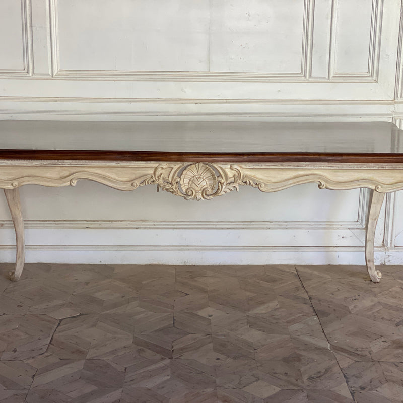 Dining table with unreasonably sleek rococo