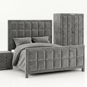 Gray upholstered bed with matching nightstand on a white background