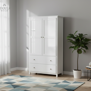 White wardrobe in a room with a plant and rug