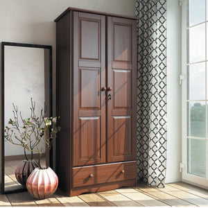 Wooden wardrobe in a room with a window and decorative elements.