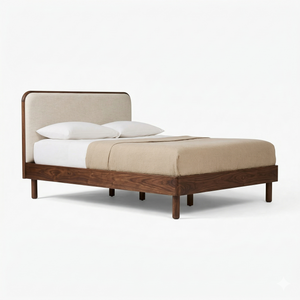 Bed with wooden frame and beige upholstered headboard on a white background