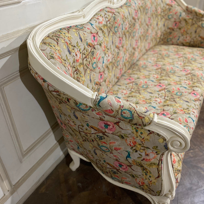 Sofa of Louis XV elegance with a slightly higher back