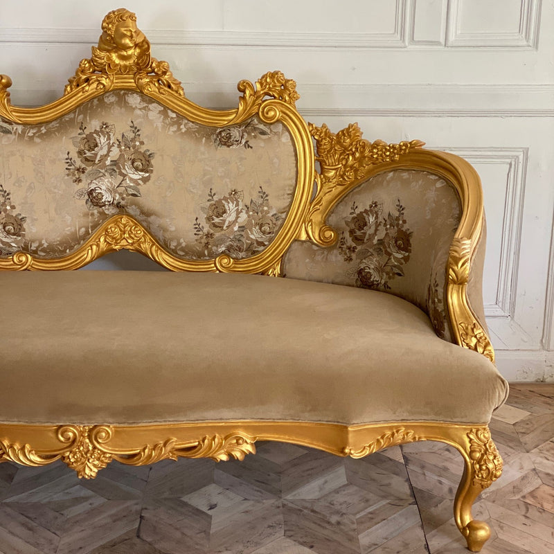 Louis XV sofa with cherub details