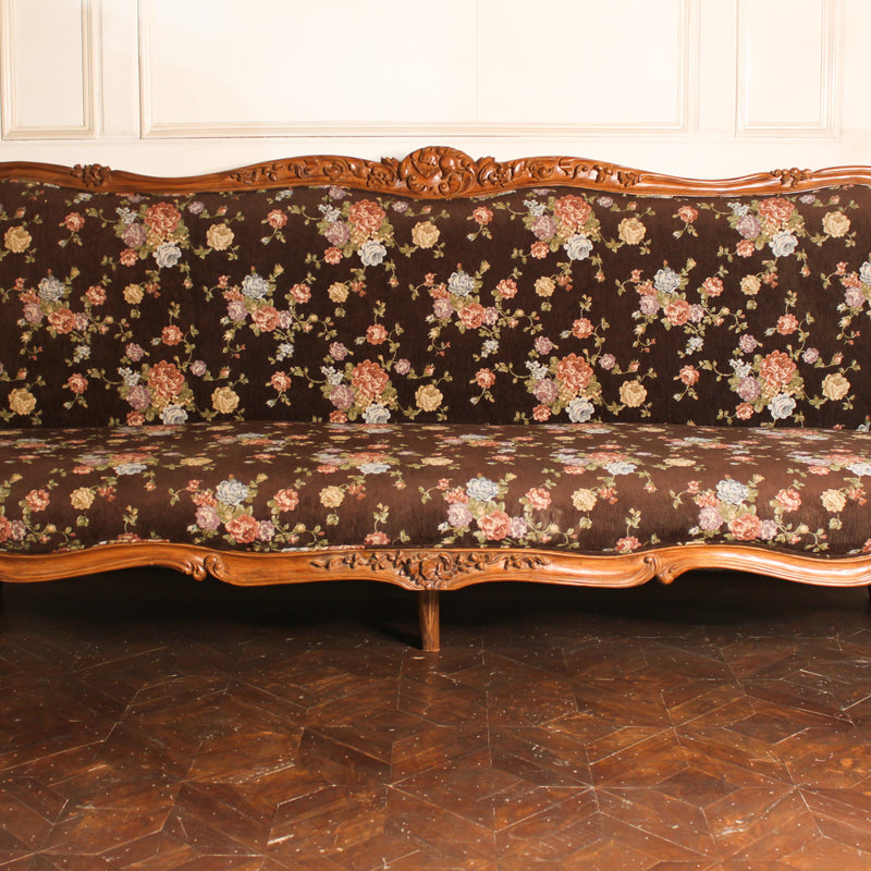 Sofa of significant Louis XV features, seating for five