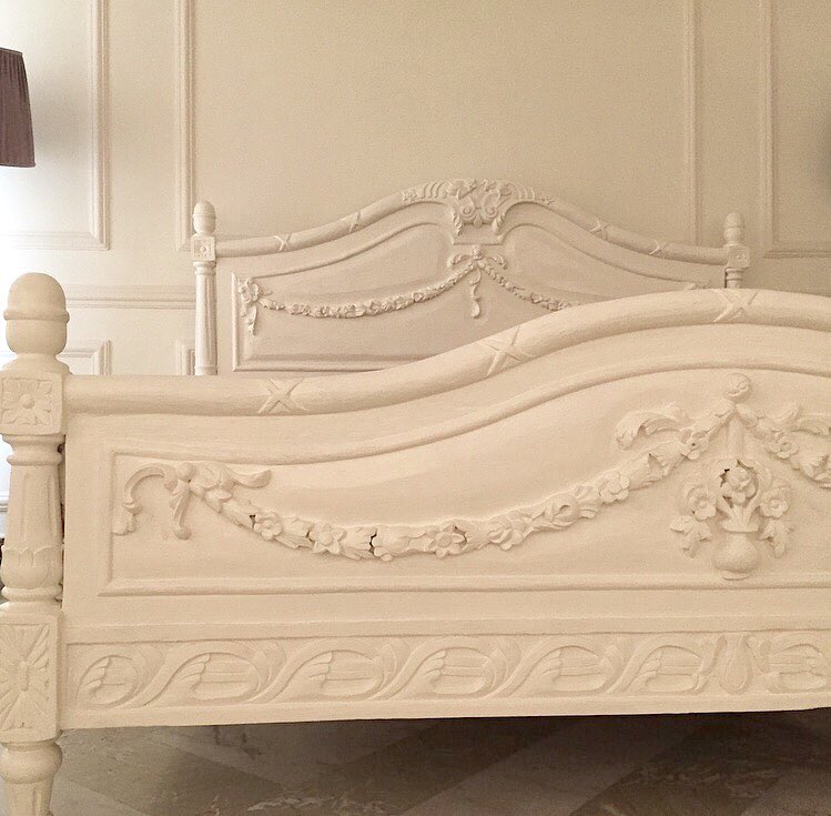Louis XVI bed with exuberant motifs