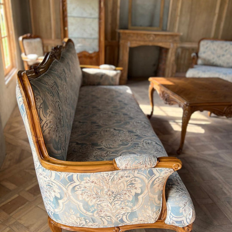Louis XV sofa of graceful curves