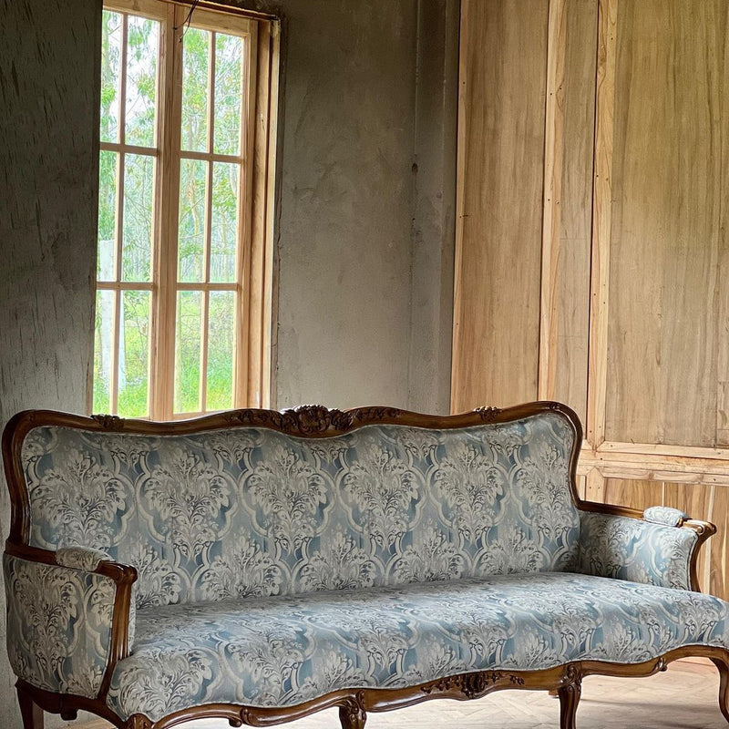 Louis XV sofa of graceful curves