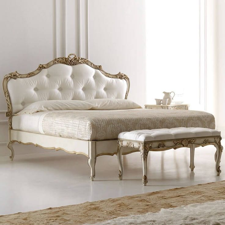 Italian Rococo button upholstered bed with an antique white and gold finish